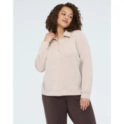 Bluza polo z świecącymi aplikacjami
