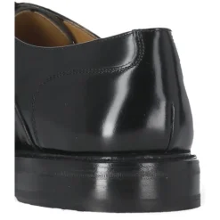 Czarne płaskie buty z podwyższoną podeszwą