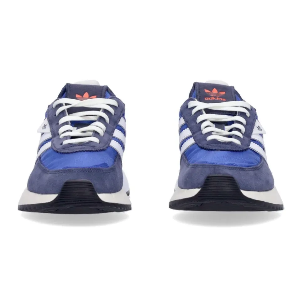 Niebieskie niskie buty sportowe z białymi detalami