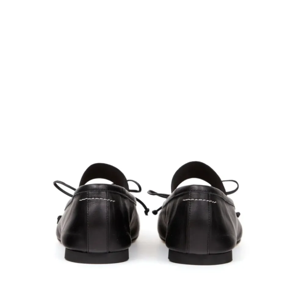 Płaskie buty z kokardą ze skóry