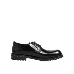 Skórzane, zdobione ćwiekami, eleganckie buty Derby