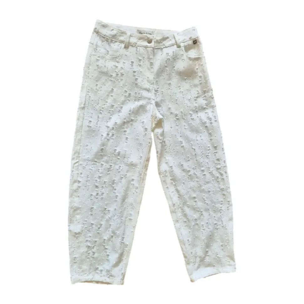 Spodnie bawełniane z efektem denimu distressed z cekinami